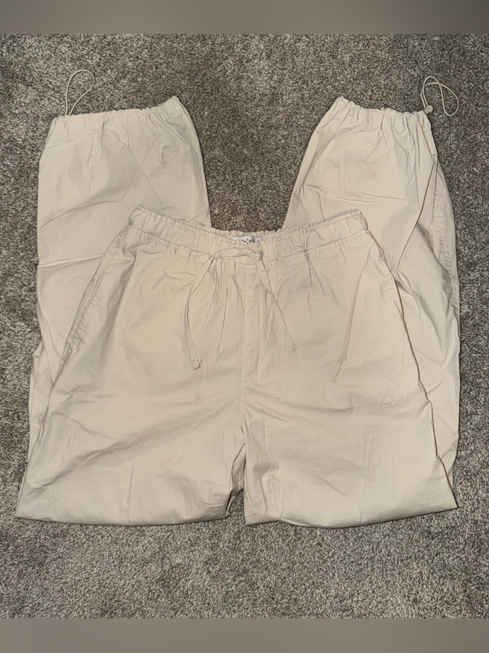 vanilla star cream parachute cargo pants with adjustable waist